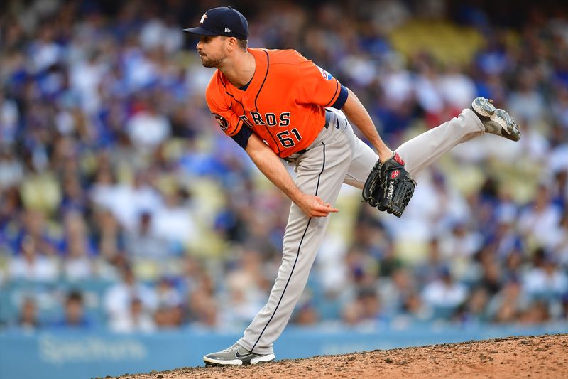 Jun 25, 2023; Los Angeles, California, USA; Houston Astros relief pitcher Seth Martinez (61) throws against the Los Angeles Dodgers during the eleventh inning at Dodger Stadium. Mandatory Credit: Gary A. Vasquez-USA TODAY Sports