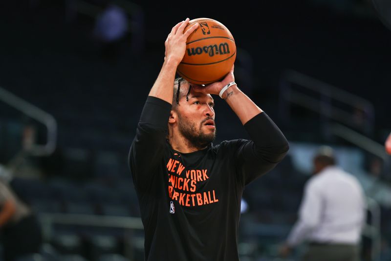 NEW YORK, NEW YORK - DECEMBER 25: Jalen Brunson #11 of the New York Knicks shoots during warm up prior to the game against the Milwaukee Bucks at Madison Square Garden on December 25, 2023 in New York City.  NOTE TO USER: User expressly acknowledges and agrees that, by downloading and or using this photograph, User is consenting to the terms and conditions of the Getty Images License Agreement. (Photo by Rich Graessle/Getty Images)