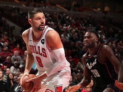 CHICAGO, IL - NOVEMBER 12: Nikola Vucevic #9 of the Chicago Bulls handles the ball during the game against the Detroit Pistons on November 12, 2023 at United Center in Chicago, Illinois. NOTE TO USER: User expressly acknowledges and agrees that, by downloading and or using this photograph, User is consenting to the terms and conditions of the Getty Images License Agreement. Mandatory Copyright Notice: Copyright 2023 NBAE (Photo by Gary Dineen/NBAE via Getty Images)