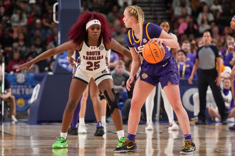 Mar 10, 2024; Greensville, SC, USA; South Carolina Gamecocks guard Raven Johnson (25) on defense against LSU Lady Tigers guard Hailey Van Lith (11) during the second half at Bon Secours Wellness Arena. Mandatory Credit: Jim Dedmon-USA TODAY Sports