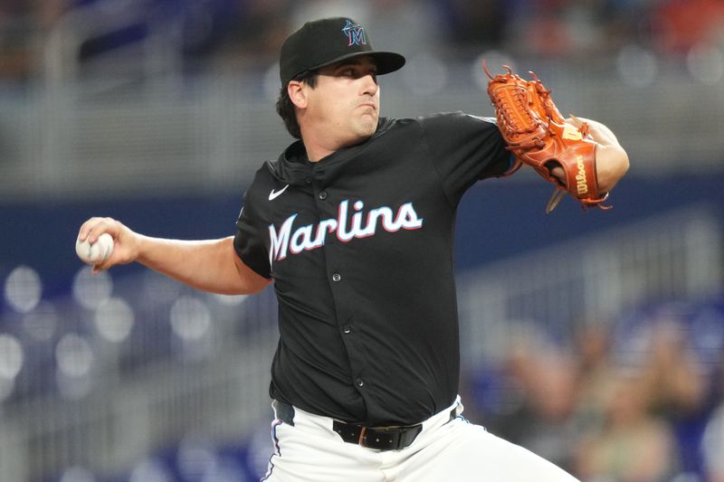 May 30, 2025; Miami, Florida, USA;  Miami Marlins pitcher Cal Quantrill (47) pitches in the first inning against the San Francisco Giants at loanDepot Park. Mandatory Credit: Jim Rassol-Imagn Images