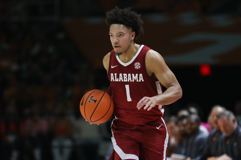 Jan 20, 2024; Knoxville, Tennessee, USA; Alabama Crimson Tide guard Mark Sears (1) brings the ball up court against the Tennessee Volunteers during the second half at Thompson-Boling Arena at Food City Center. Mandatory Credit: Randy Sartin-USA TODAY Sports