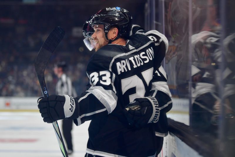 Apr 18, 2024; Los Angeles, California, USA; Los Angeles Kings right wing Viktor Arvidsson (33) celebrates his goal scored against the Chicago Blackhawks during the second period at Crypto.com Arena. Mandatory Credit: Gary A. Vasquez-USA TODAY Sports