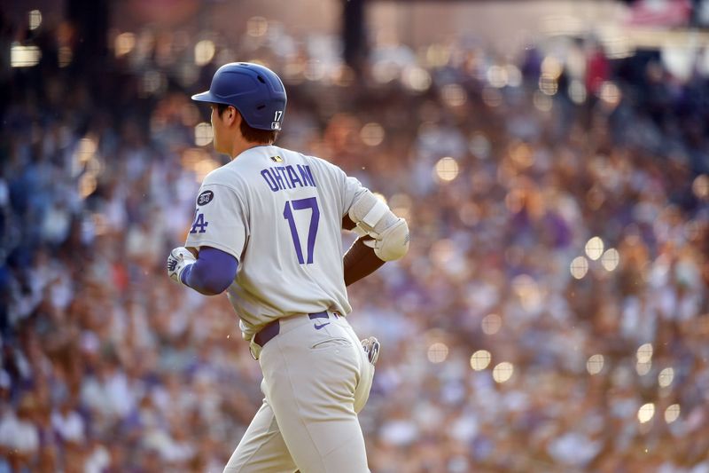 Jun 25, 2025; Denver, Colorado, USA; Los Angeles Dodgers two-way player Shohei Ohtani (17) after a pop fly out during his at bat in the first inning against the Colorado Rockies at Coors Field. Mandatory Credit: Christopher Hanewinckel-Imagn Images