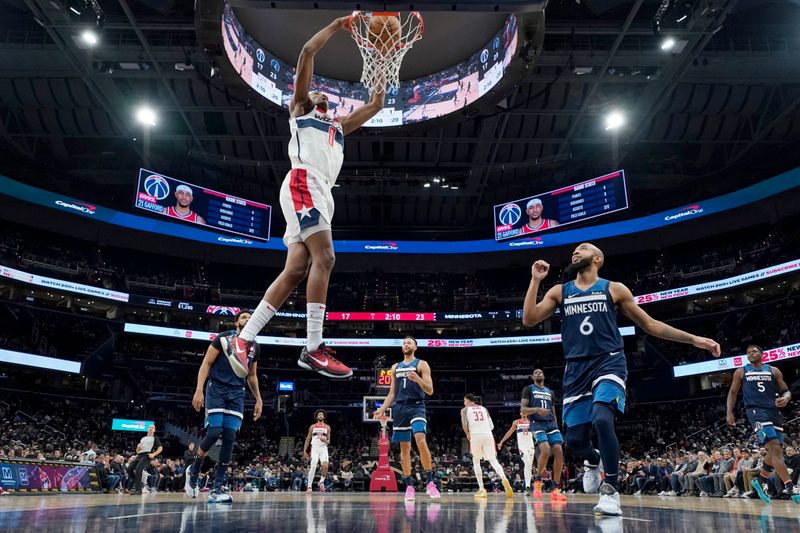 WASHINGTON, DC - JANUARY 24: Bilal Coulibaly #0 of the Washington Wizards dunks against the Minnesota Timberwolves during the first half at Capital One Arena on January 24, 2024 in Washington, DC. NOTE TO USER: User expressly acknowledges and agrees that, by downloading and or using this photograph, User is consenting to the terms and conditions of the Getty Images License Agreement. (Photo by Jess Rapfogel/Getty Images)