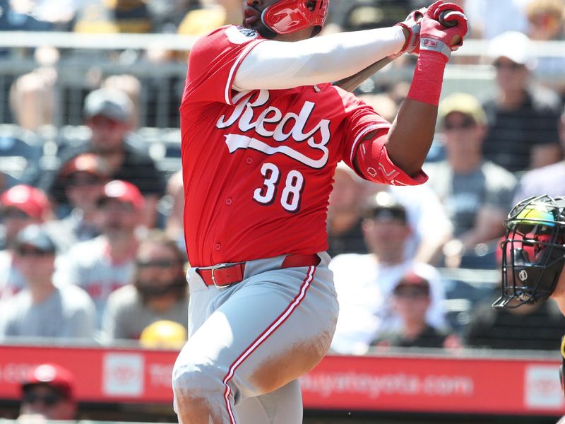 Aug 10, 2025; Pittsburgh, Pennsylvania, USA;  Cincinnati Reds designated hitter Miguel Andujar (38) hits a three run home run against the Pittsburgh Pirates during the third inning at PNC Park. Mandatory Credit: Charles LeClaire-Imagn Images