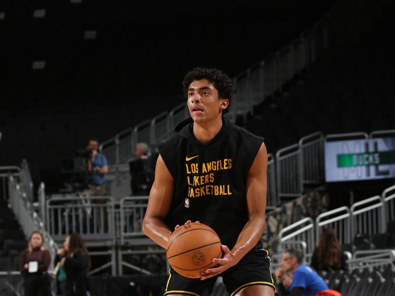 MILWAUKEE, WI - MARCH 26: Max Christie #10 of the Los Angeles Lakers warms up before the game against the Milwaukee Bucks on March 26, 2024 at the Fiserv Forum Center in Milwaukee, Wisconsin. NOTE TO USER: User expressly acknowledges and agrees that, by downloading and or using this Photograph, user is consenting to the terms and conditions of the Getty Images License Agreement. Mandatory Copyright Notice: Copyright 2024 NBAE (Photo by Gary Dineen/NBAE via Getty Images).