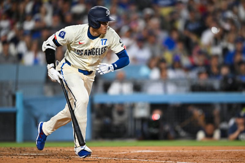 Jun 22, 2024; Los Angeles, California, USA; Los Angeles Dodgers designated hitter Shohei Ohtani (17) forced out a first base against the Los Angeles Angels during the sixth inning at Dodger Stadium. Mandatory Credit: Jonathan Hui-USA TODAY Sports