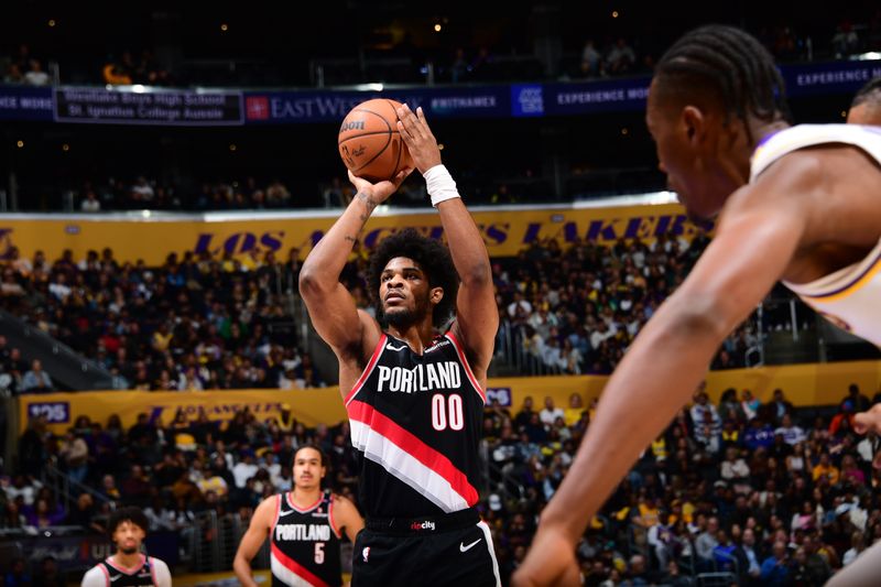 LOS ANGELES, CA - DECEMBER 8: Scoot Henderson #00 of the Portland Trail Blazers shoots a free throw during the game against the Los Angeles Lakers on December 8, 2024 at Crypto.Com Arena in Los Angeles, California. NOTE TO USER: User expressly acknowledges and agrees that, by downloading and/or using this Photograph, user is consenting to the terms and conditions of the Getty Images License Agreement. Mandatory Copyright Notice: Copyright 2024 NBAE (Photo by Adam Pantozzi/NBAE via Getty Images)