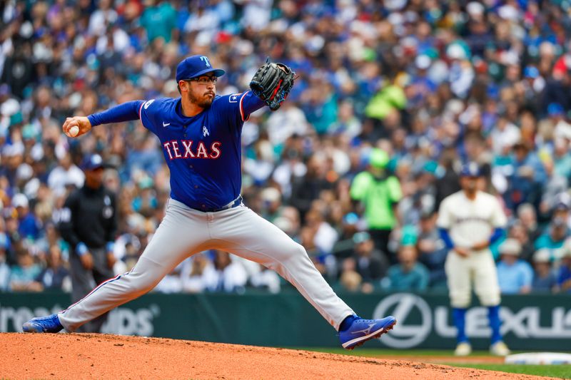Jun 16, 2024; Seattle, Washington, USA; Texas Rangers starting pitcher Dane Dunning (33) throws against the Seattle Mariners during the second inning at T-Mobile Park. Mandatory Credit: Joe Nicholson-USA TODAY Sports