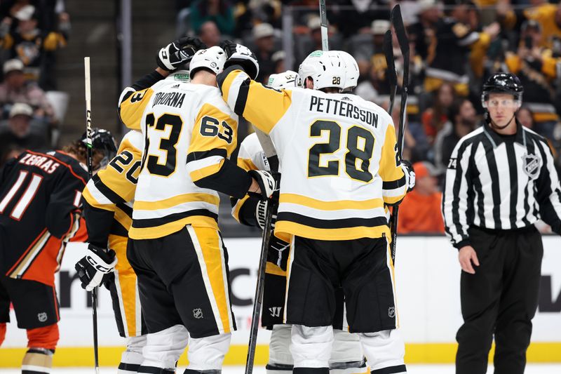 Nov 7, 2023; Anaheim, California, USA; Pittsburgh Penguins forward Radim Zohorna (63) celebrates with teammates after scoring a goal during the first period against the Anaheim Ducks at Honda Center. Mandatory Credit: Kiyoshi Mio-USA TODAY Sports