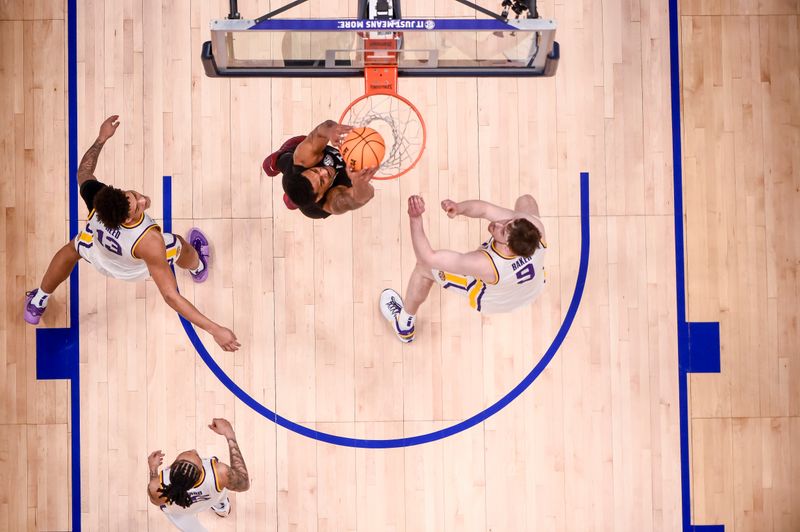 Mar 14, 2024; Nashville, TN, USA; Mississippi State Bulldogs forward D.J. Jeffries (0) lays the ball in during the second half at Bridgestone Arena. Mandatory Credit: Steve Roberts-USA TODAY Sports