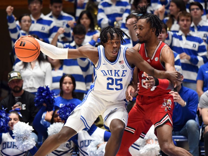 Feb 20, 2023; Durham, North Carolina, USA; Duke Blue Devils forward Mark Mitchell (25) controls the ball in front of Louisville Cardinals forward Jae'Lyn Withers (24) during the first half at Cameron Indoor Stadium. Mandatory Credit: Rob Kinnan-USA TODAY Sports