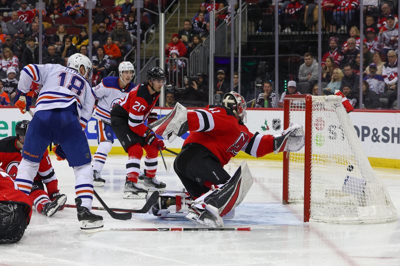 Dec 21, 2023; Newark, New Jersey, USA; Edmonton Oilers center Connor McDavid (97) (not shown) scores a goal on New Jersey Devils goaltender Vitek Vanecek (41) during the third period at Prudential Center. Mandatory Credit: Ed Mulholland-USA TODAY Sports