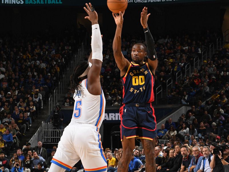 SAN FRANCISCO, CA - NOVEMBER 27: Jonathan Kuminga #00 of the Golden State Warriors shoots the ball during the game against the Oklahoma City Thunder on November 27, 2024 at Chase Center in San Francisco, California. NOTE TO USER: User expressly acknowledges and agrees that, by downloading and or using this photograph, user is consenting to the terms and conditions of Getty Images License Agreement. Mandatory Copyright Notice: Copyright 2024 NBAE (Photo by Noah Graham/NBAE via Getty Images)