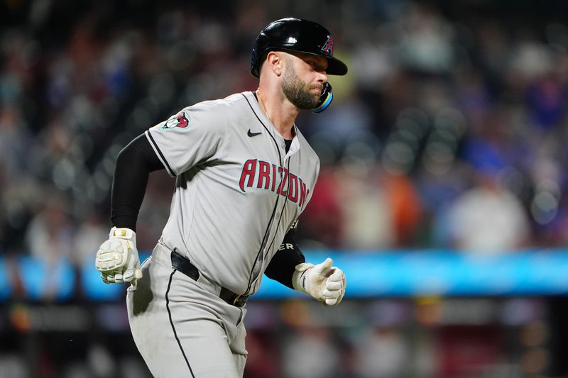 May 31, 2024; New York City, New York, USA; Arizona Diamondbacks first baseman Christian Walker (53) rounds the bases after hitting a home run against the New York Mets during the ninth inning at Citi Field. Mandatory Credit: Gregory Fisher-USA TODAY Sports