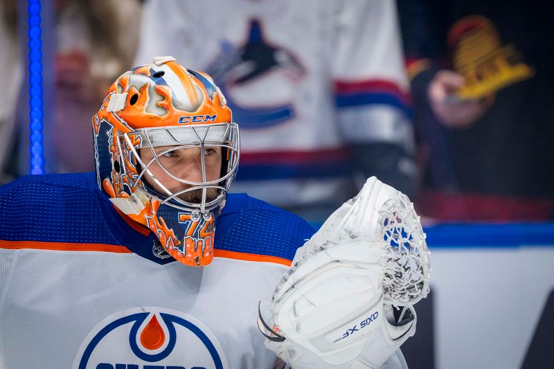 May 20, 2024; Vancouver, British Columbia, CAN; Edmonton Oilers goalie Stuart Skinner (74) rests in warm up prior to game seven of the second round of the 2024 Stanley Cup Playoffs against the Vancouver Canucks at Rogers Arena. Mandatory Credit: Bob Frid-USA TODAY Sports