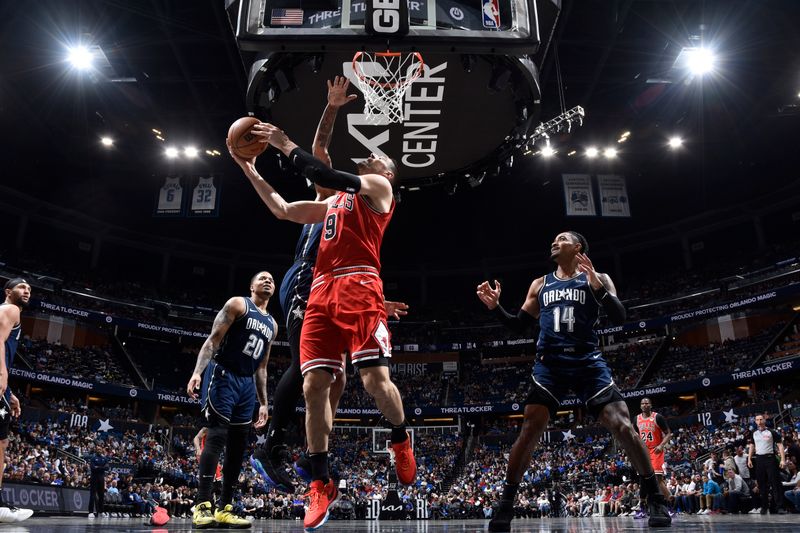 ORLANDO, FL - APRIL 7: Nikola Vucevic #9 of the Chicago Bulls drives to the basket during the game against the Orlando Magic on April 7, 2024 at the Kia Center in Orlando, Florida. NOTE TO USER: User expressly acknowledges and agrees that, by downloading and or using this photograph, User is consenting to the terms and conditions of the Getty Images License Agreement. Mandatory Copyright Notice: Copyright 2024 NBAE (Photo by Fernando Medina/NBAE via Getty Images)