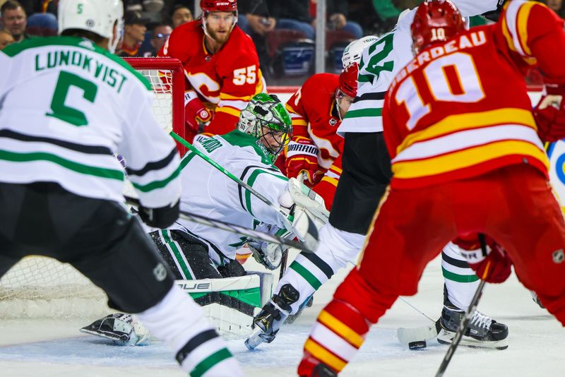 Nov 30, 2023; Calgary, Alberta, CAN; Dallas Stars goaltender Scott Wedgewood (41) makes a save against the Calgary Flames during the second period at Scotiabank Saddledome. Mandatory Credit: Sergei Belski-USA TODAY Sports