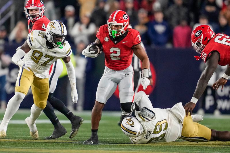 Nov 25, 2023; Atlanta, Georgia, USA; Georgia Bulldogs running back Kendall Milton (2) runs against the Georgia Tech Yellow Jackets  during the first half at Hyundai Field. Mandatory Credit: Dale Zanine-USA TODAY Sports