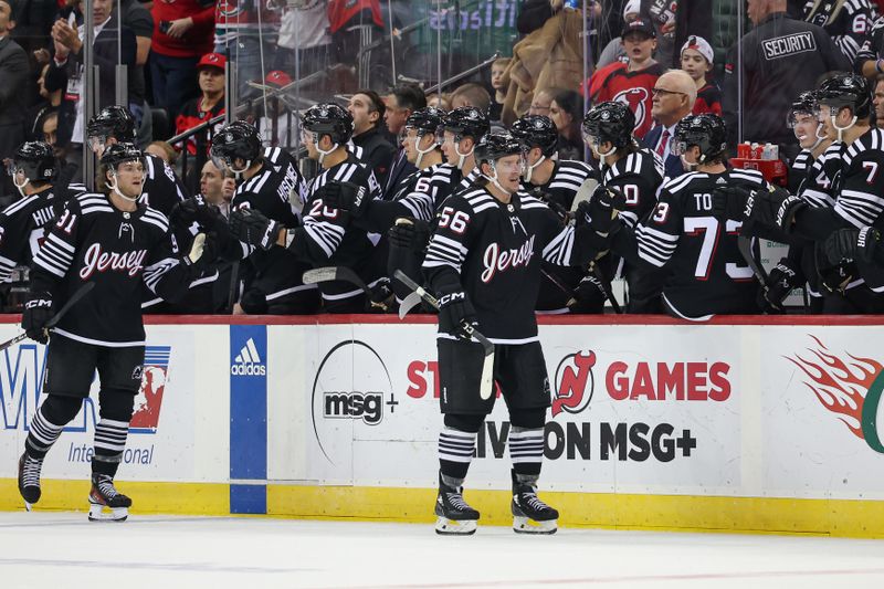 Oct 27, 2023; Newark, New Jersey, USA; New Jersey Devils left wing Erik Haula (56) celebrates his goal with teammates during the second period against the Buffalo Sabres at Prudential Center. Mandatory Credit: Vincent Carchietta-USA TODAY Sports