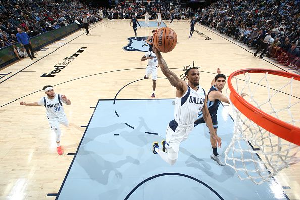 MEMPHIS, TN - DECEMBER 11:  AJ Lawson #9 of the Dallas Mavericks dunks the ball during the game against the Memphis Grizzlies on December 11, 2023 at FedExForum in Memphis, Tennessee. NOTE TO USER: User expressly acknowledges and agrees that, by downloading and or using this photograph, User is consenting to the terms and conditions of the Getty Images License Agreement. Mandatory Copyright Notice: Copyright 2023 NBAE (Photo by Joe Murphy/NBAE via Getty Images)