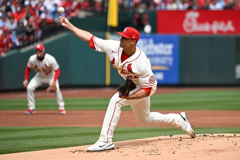 Apr 1, 2023; St. Louis, Missouri, USA; St. Louis Cardinals starting pitcher Jack Flaherty (22) pitches against the Toronto Blue Jays in the first inning at Busch Stadium. Mandatory Credit: Joe Puetz-USA TODAY Sports