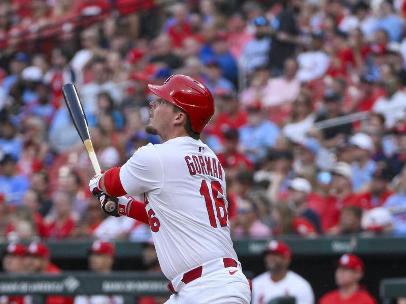 Jun 3, 2025; St. Louis, Missouri, USA;  St. Louis Cardinals designated hitter Nolan Gorman (16) hits a two run home run against the Kansas City Royals during the second inning at Busch Stadium. Mandatory Credit: Jeff Curry-Imagn Images