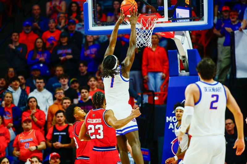 Feb 17, 2024; Boise, Idaho, USA; Boise State Broncos forward O'Mar Stanley (1) with a dunk during the first half against the Fresno State Bulldogs at ExtraMile Arena. Mandatory Credit: Brian Losness-USA TODAY Sports

