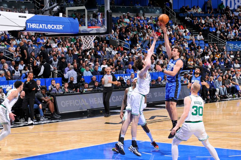 ORLANDO, FL - APRIL 9:  Franz Wagner #22 of the Orlando Magic shoots the ball during the game against the Boston Celtics on April 9, 2025 at Kia Center in Orlando, Florida. NOTE TO USER: User expressly acknowledges and agrees that, by downloading and or using this photograph, User is consenting to the terms and conditions of the Getty Images License Agreement. Mandatory Copyright Notice: Copyright 2025 NBAE (Photo by Fernando Medina/NBAE via Getty Images)