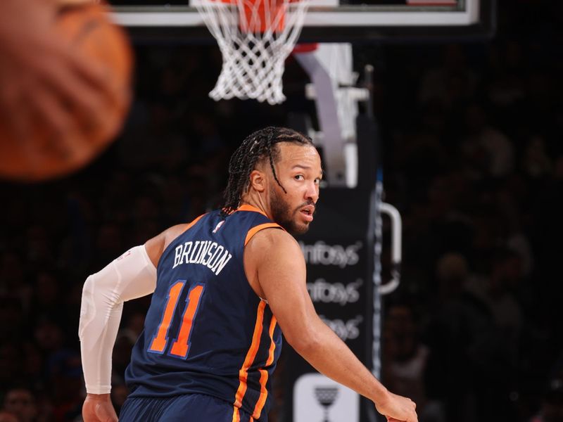 NEW YORK, NY - NOVEMBER 8: Jalen Brunson #11 of the New York Knicks looks on during the game against the Milwaukee Bucks on November 8, 2024 at Madison Square Garden in New York City, New York.  NOTE TO USER: User expressly acknowledges and agrees that, by downloading and or using this photograph, User is consenting to the terms and conditions of the Getty Images License Agreement. Mandatory Copyright Notice: Copyright 2024 NBAE  (Photo by Nathaniel S. Butler/NBAE via Getty Images)