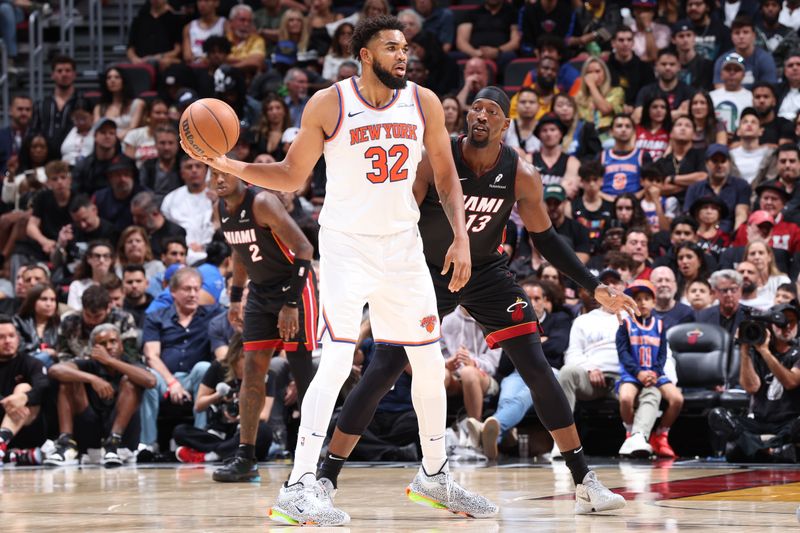 MIAMI, FL - OCTOBER 30: Karl-Anthony Towns #32 of the New York Knicks looks on during the game against the Miami Heat on October 30, 2024 at Kaseya Center in Miami, Florida. NOTE TO USER: User expressly acknowledges and agrees that, by downloading and or using this Photograph, user is consenting to the terms and conditions of the Getty Images License Agreement. Mandatory Copyright Notice: Copyright 2024 NBAE (Photo by Jeff Haynes/NBAE via Getty Images)