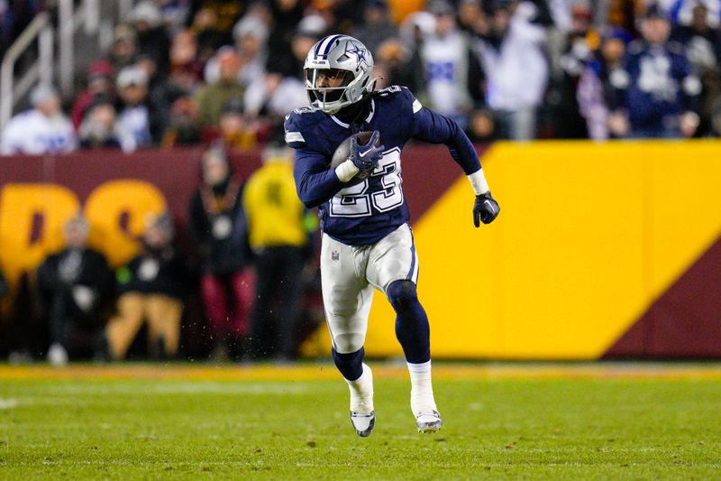 Dallas Cowboys running back Rico Dowdle runs with the ball against the Washington Commanders during the first half, Sunday, January 7, 2024, in Landover, Md. Dallas won 38-10. (AP Photo/Jess Rapfogel)