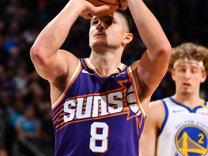 PHOENIX, AZ - NOVEMBER 30: Grayson Allen #8 of the Phoenix Suns shoots the ball during the game against the Golden State Warriors on November 30, 2024 at Footprint Center in Phoenix, Arizona. NOTE TO USER: User expressly acknowledges and agrees that, by downloading and or using this photograph, user is consenting to the terms and conditions of the Getty Images License Agreement. Mandatory Copyright Notice: Copyright 2024 NBAE (Photo by Barry Gossage/NBAE via Getty Images)