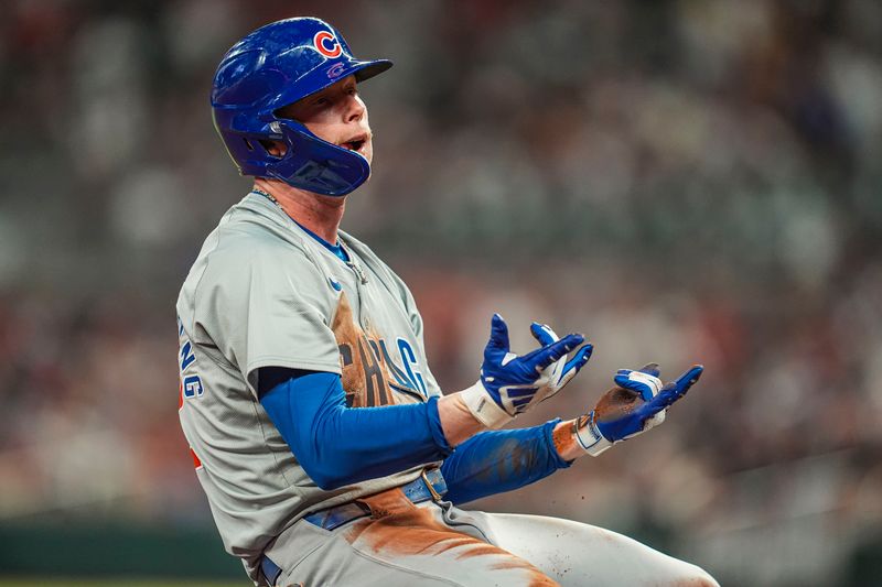 May 15, 2024; Cumberland, Georgia, USA; Chicago Cubs center fielder Pete Crow-Armstrong (52) reacts after hitting a triple against the Atlanta Braves during the eight inning at Truist Park. Mandatory Credit: Dale Zanine-USA TODAY Sports