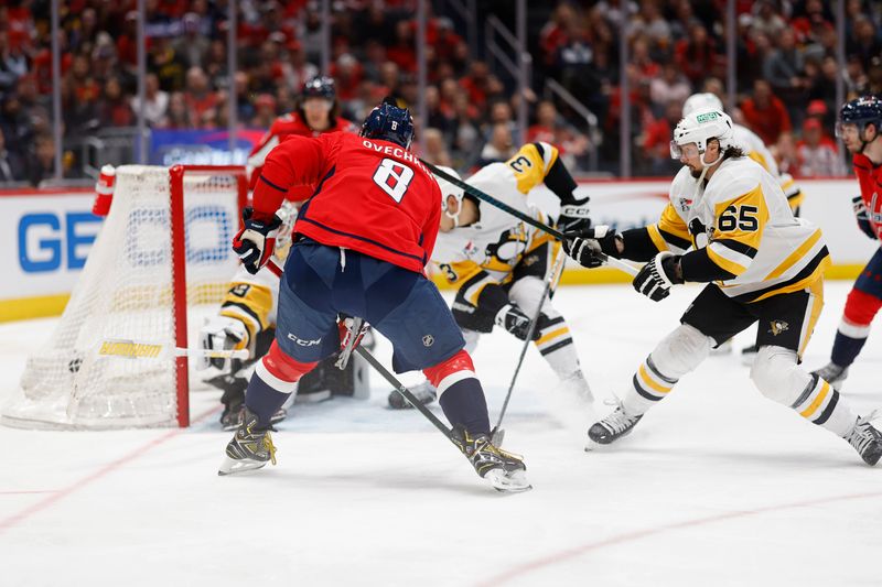 Apr 4, 2024; Washington, District of Columbia, USA; Washington Capitals left wing Alex Ovechkin (8) scores a goal on Pittsburgh Penguins goaltender Alex Nedeljkovic (39) in the third period at Capital One Arena. Mandatory Credit: Geoff Burke-USA TODAY Sports