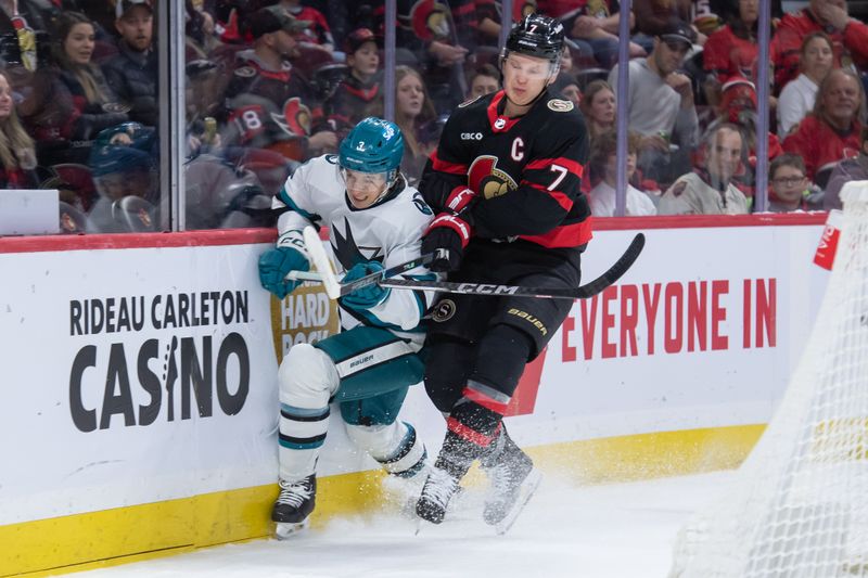 Jan 13, 2024; Ottawa, Ontario, CAN; San Jose Sharks defenseman Henry Thrun (3) is checked by Ottawa Senators left wing Brady Tkachuk (7) in the first period at the Canadian Tire Centre. Mandatory Credit: Marc DesRosiers-USA TODAY Sports