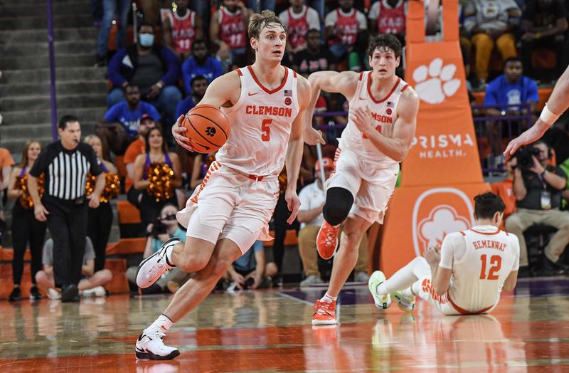 Feb 22, 2023; Clemson, South Carolina, USA; Clemson forward Hunter Tyson (5) brings the ball up court against Syracuse during the second half at Littlejohn Coliseum. Mandatory Credit: Ken Ruinard-USA TODAY Sports