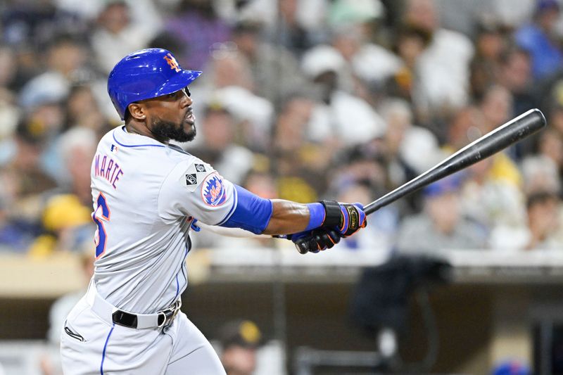 Aug 23, 2024; San Diego, California, USA; New York Mets right fielder Starling Marte (6) hits a single during the fifth inning against the San Diego Padres at Petco Park. Mandatory Credit: Denis Poroy-USA TODAY Sports