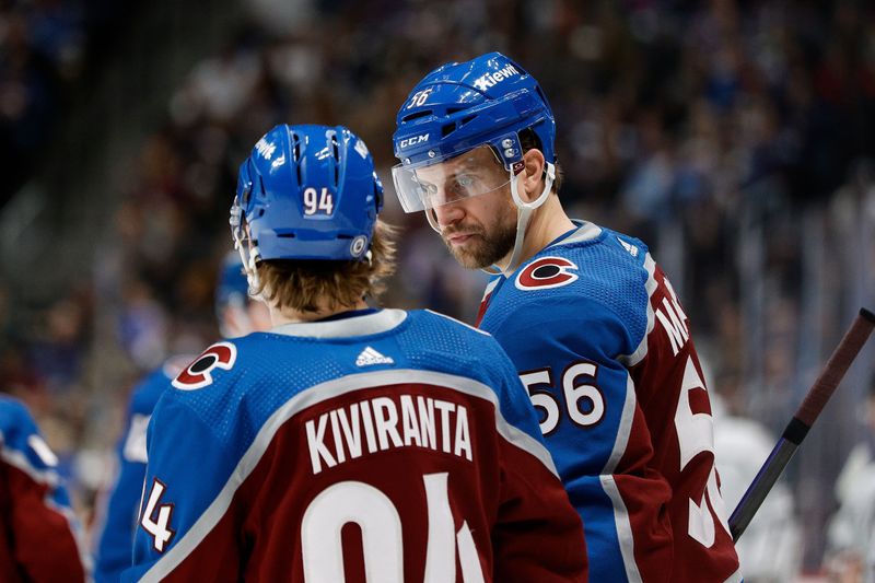 Jan 26, 2024; Denver, Colorado, USA; Colorado Avalanche defenseman Kurtis MacDermid (56) and left wing Joel Kiviranta (94) in the first period against the Los Angeles Kings at Ball Arena. Mandatory Credit: Isaiah J. Downing-USA TODAY Sports