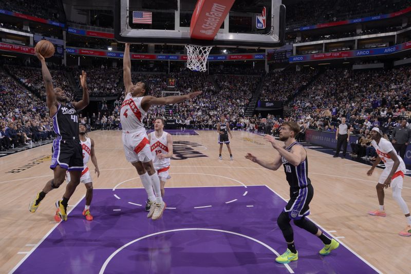 SACRAMENTO, CA - JANUARY 5: Trey Lyles #41 of the Sacramento Kings shoots the ball during the game against the Toronto Raptors on January 5, 2024 at Golden 1 Center in Sacramento, California. NOTE TO USER: User expressly acknowledges and agrees that, by downloading and or using this Photograph, user is consenting to the terms and conditions of the Getty Images License Agreement. Mandatory Copyright Notice: Copyright 2024 NBAE (Photo by Rocky Widner/NBAE via Getty Images)