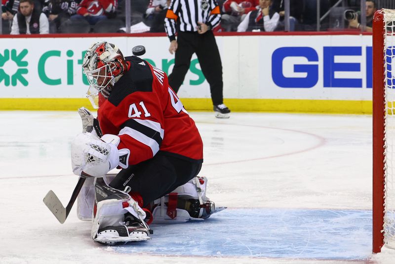 Feb 6, 2024; Newark, New Jersey, USA; New Jersey Devils goaltender Vitek Vanecek (41) makes a save against the Colorado Avalanche during the third period at Prudential Center. Mandatory Credit: Ed Mulholland-USA TODAY Sports