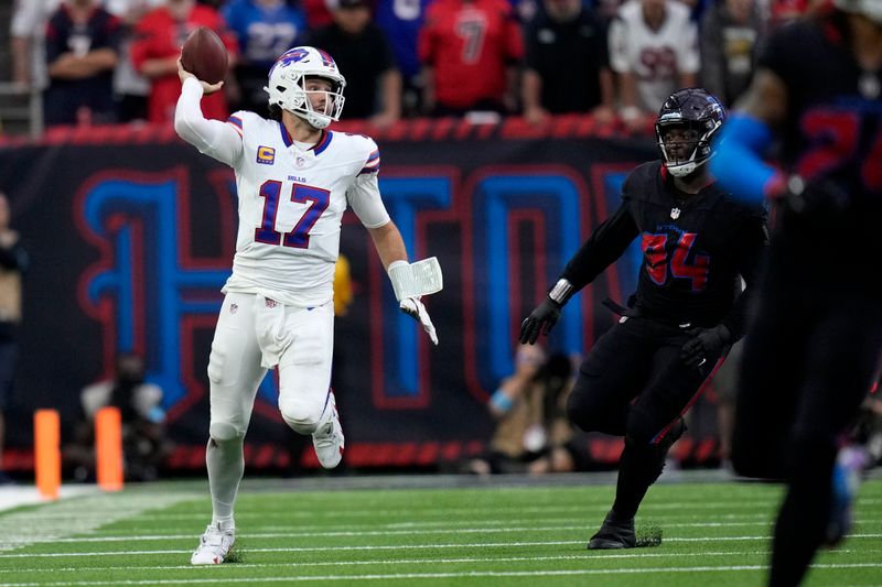 Buffalo Bills quarterback Josh Allen (17) scrambles up field past Houston Texans defensive tackle Khalil Davis (94) during the second half of an NFL football game, Sunday, Oct. 6, 2024, in Houston. (AP Photo/Eric Gay)