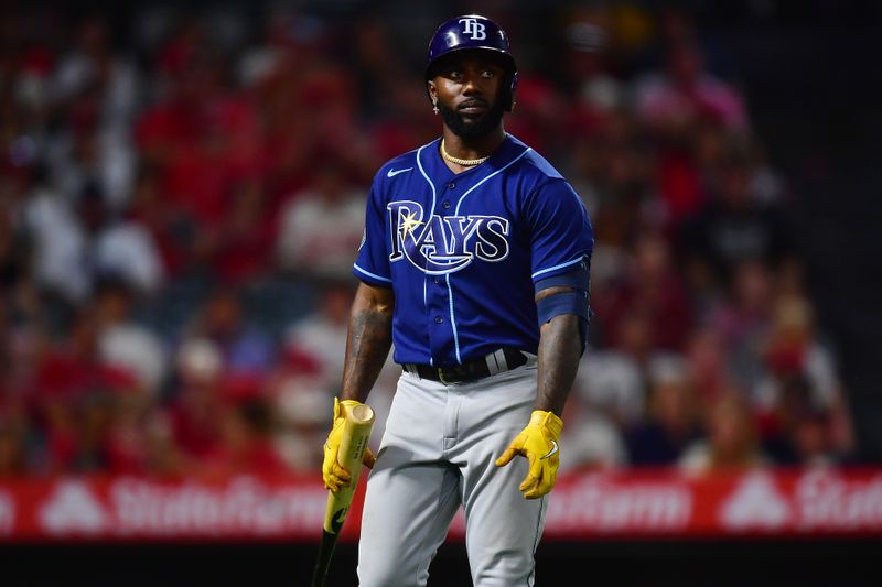 Aug 18, 2023; Anaheim, California, USA; Tampa Bay Rays left fielder Randy Arozarena (56) reacts after striking out against the Los Angeles Angels during the seventh inning at Angel Stadium. Mandatory Credit: Gary A. Vasquez-USA TODAY Sports