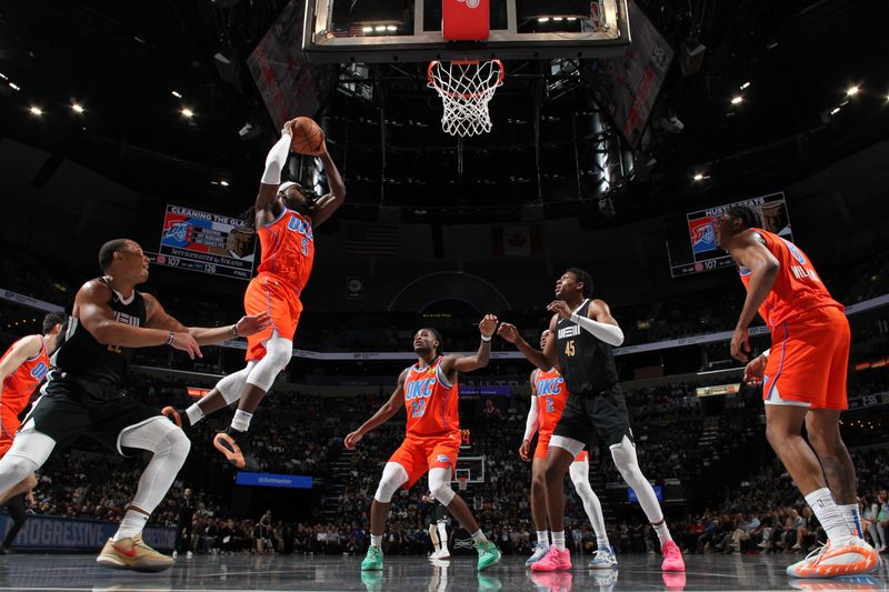 MEMPHIS, TN - MARCH 16: Luguentz Dort #5 of the Oklahoma City Thunder drives to the basket during the game against the Memphis Grizzlies on March 16, 2024 at FedExForum in Memphis, Tennessee. NOTE TO USER: User expressly acknowledges and agrees that, by downloading and or using this photograph, User is consenting to the terms and conditions of the Getty Images License Agreement. Mandatory Copyright Notice: Copyright 2024 NBAE (Photo by Joe Murphy/NBAE via Getty Images)