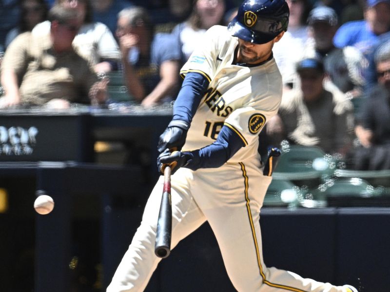 May 30, 2024; Milwaukee, Wisconsin, USA; Milwaukee Brewers outfielder Blake Perkins (16) gets a base hit against the Chicago Cubs in the second inning at American Family Field. Mandatory Credit: Michael McLoone-USA TODAY Sports