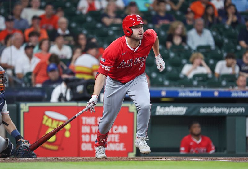 May 21, 2024; Houston, Texas, USA; Los Angeles Angels first baseman Nolan Schanuel (18) hits a single during the first inning against the Houston Astros at Minute Maid Park. Mandatory Credit: Troy Taormina-USA TODAY Sports