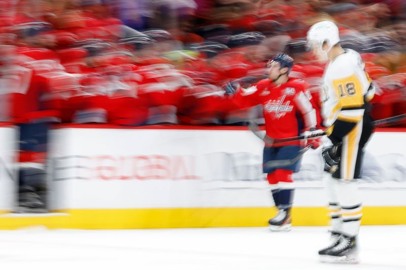 Nov 8, 2024; Washington, District of Columbia, USA; Washington Capitals left wing Andrew Mangiapane (88) celebrates with teammates after scoring a goal against the Pittsburgh Penguins in the second period at Capital One Arena. Mandatory Credit: Geoff Burke-Imagn Images