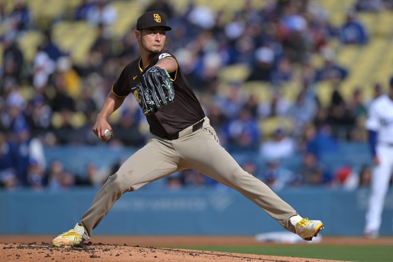 Apr 14, 2024; Los Angeles, California, USA; San Diego Padres pitcher Yu Darvish (11) throws to the plate in the first inning against the Los Angeles Dodgers at Dodger Stadium. Mandatory Credit: Jayne Kamin-Oncea-USA TODAY Sports