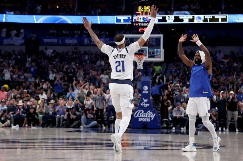 DALLAS, TEXAS - MARCH 13: Daniel Gafford #21 of the Dallas Mavericks reacts after a basket in the first half against the Golden State Warriors at American Airlines Center on March 13, 2024 in Dallas, Texas. NOTE TO USER: User expressly acknowledges and agrees that, by downloading and or using this photograph, User is consenting to the terms and conditions of the Getty Images License Agreement. (Photo by Tim Heitman/Getty Images)